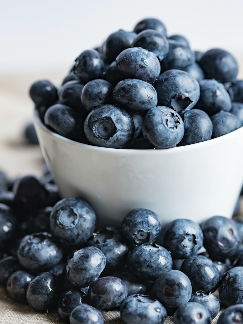 blueberries on white ceramic container